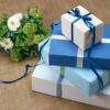 three gift boxes packed in Blue paper with Birthday Gift toys in Pakistan stepsnsmiles Ideas