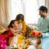 image of parents giving gift for girls to the daughter in Pakistan bought from www.steamsnsmiles.com