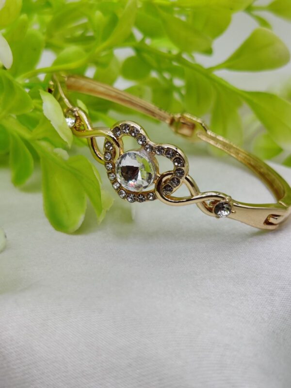1 Piece Imported Elegant Adjustable Bracelet with Different Design | Twisted, Heart, Chevron, Dazzling Crossed, Intricately Crafted Design | Adjustable Bracelet – Best Quality Artificial Bracelet For Girls & Women ( Golden )